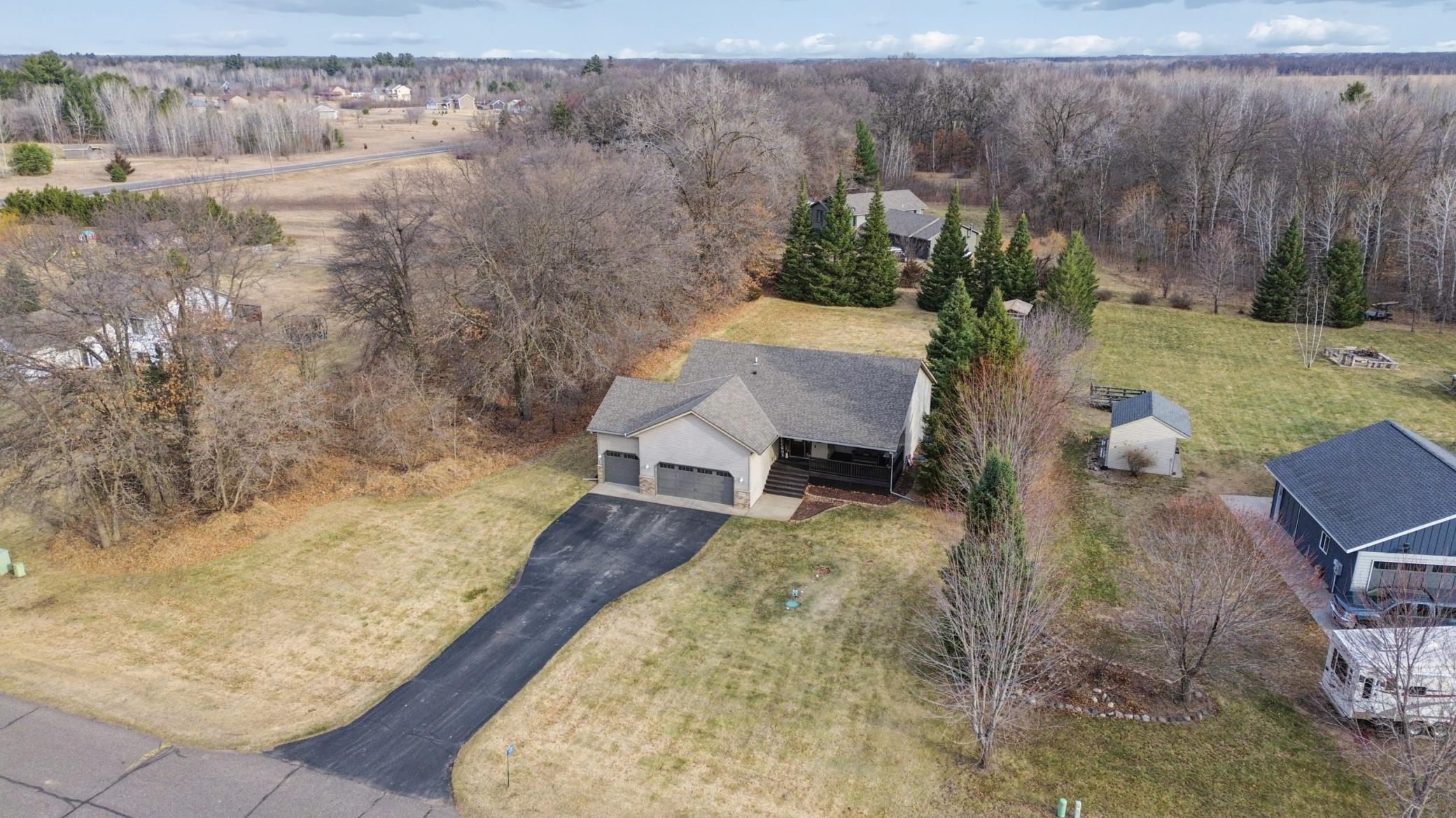 Beautifully maintained home on a spacious 1-acre lot with fenced backyard