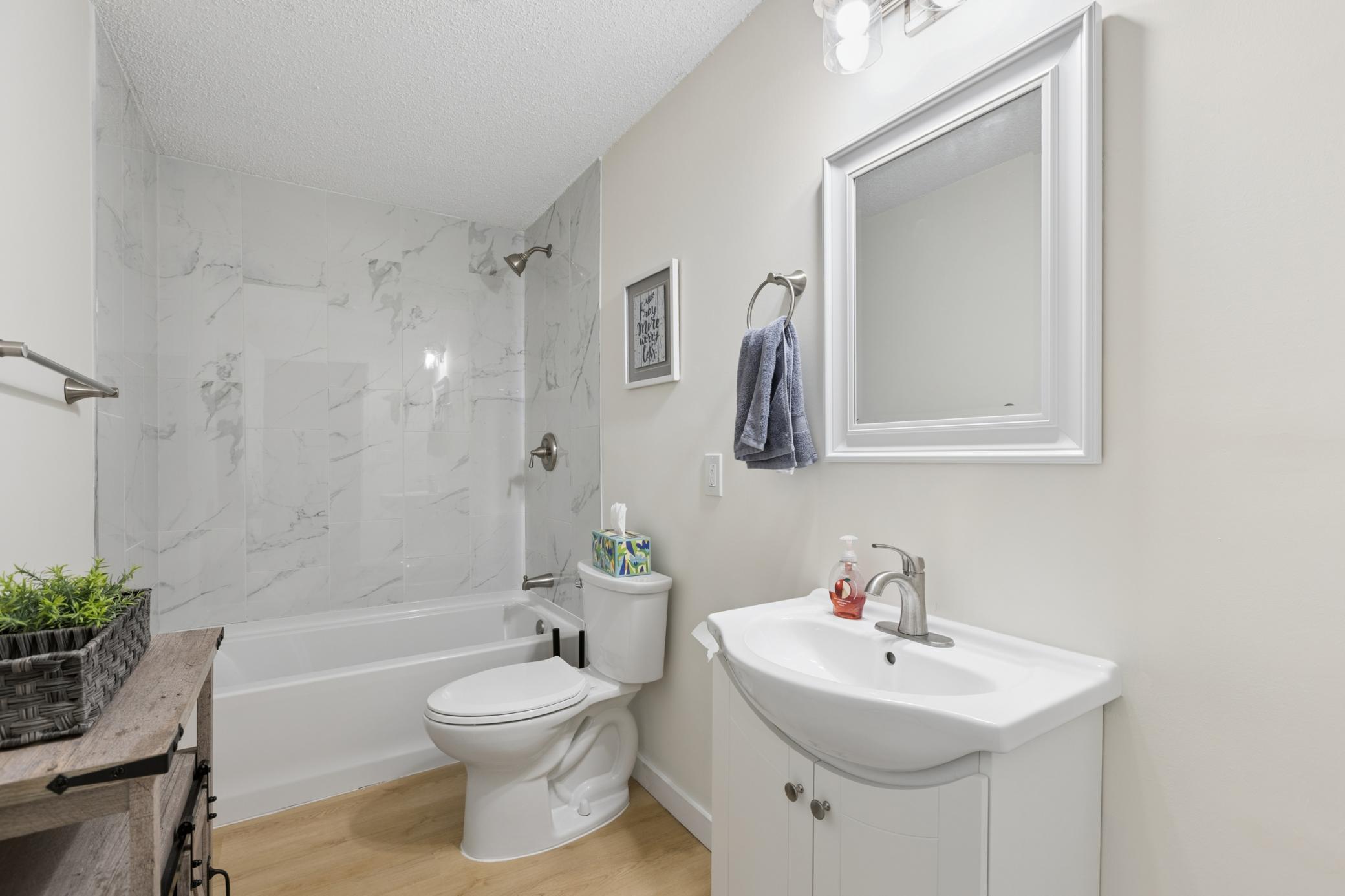 3rd bath also a full bath conveniently downstairs