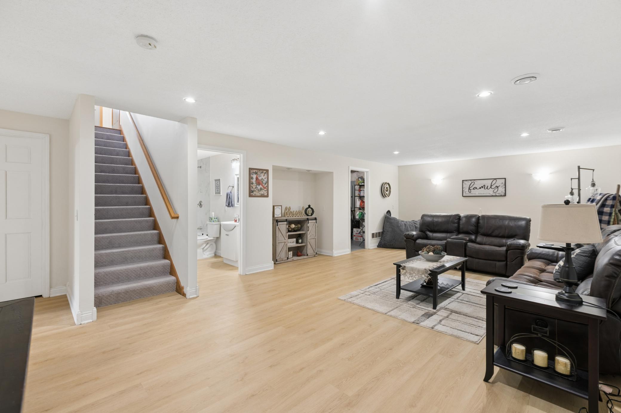 Finished basement with large family room — perfect for movie nights or game days
