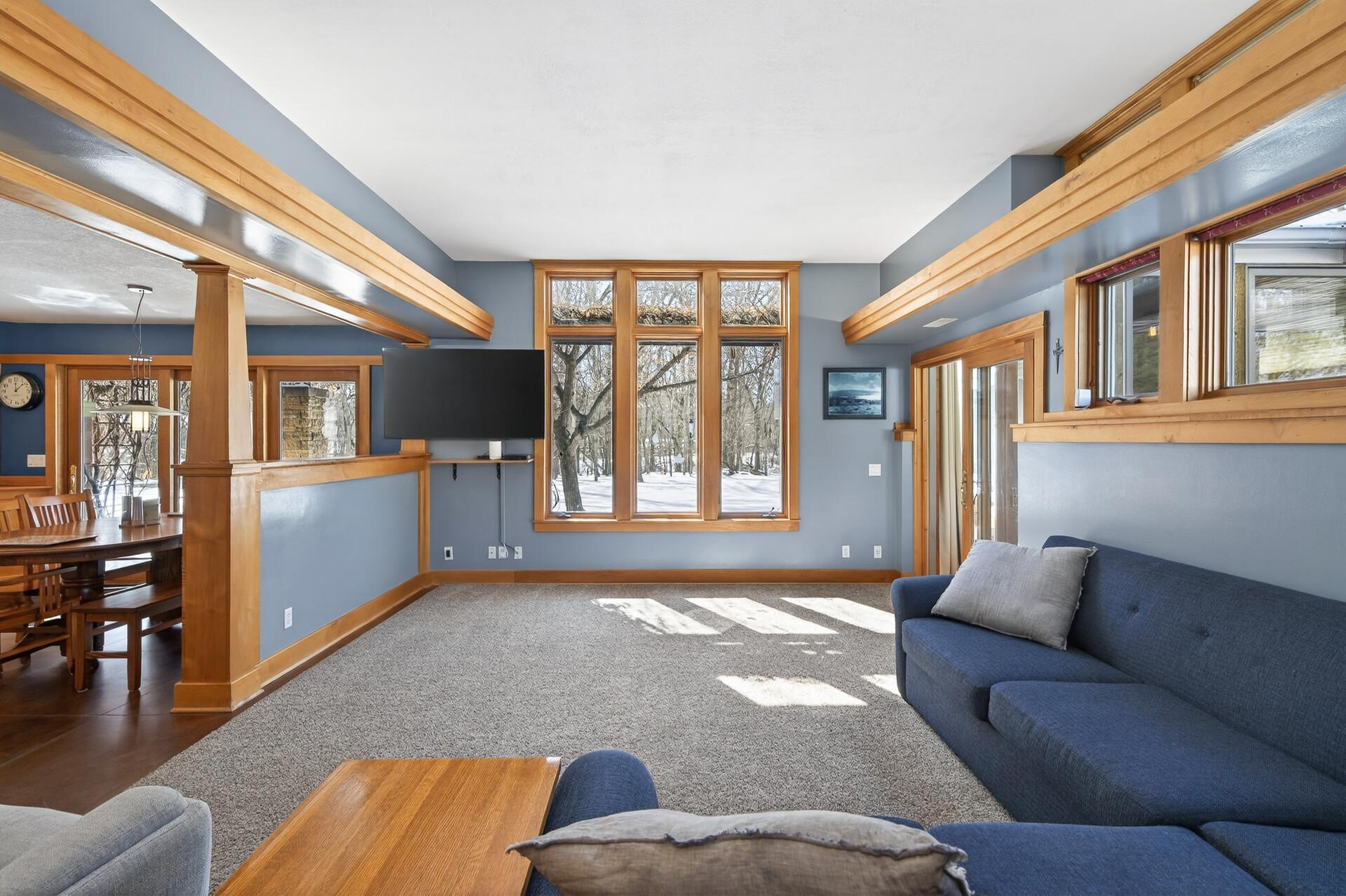Main floor living room with lots of natural lighting