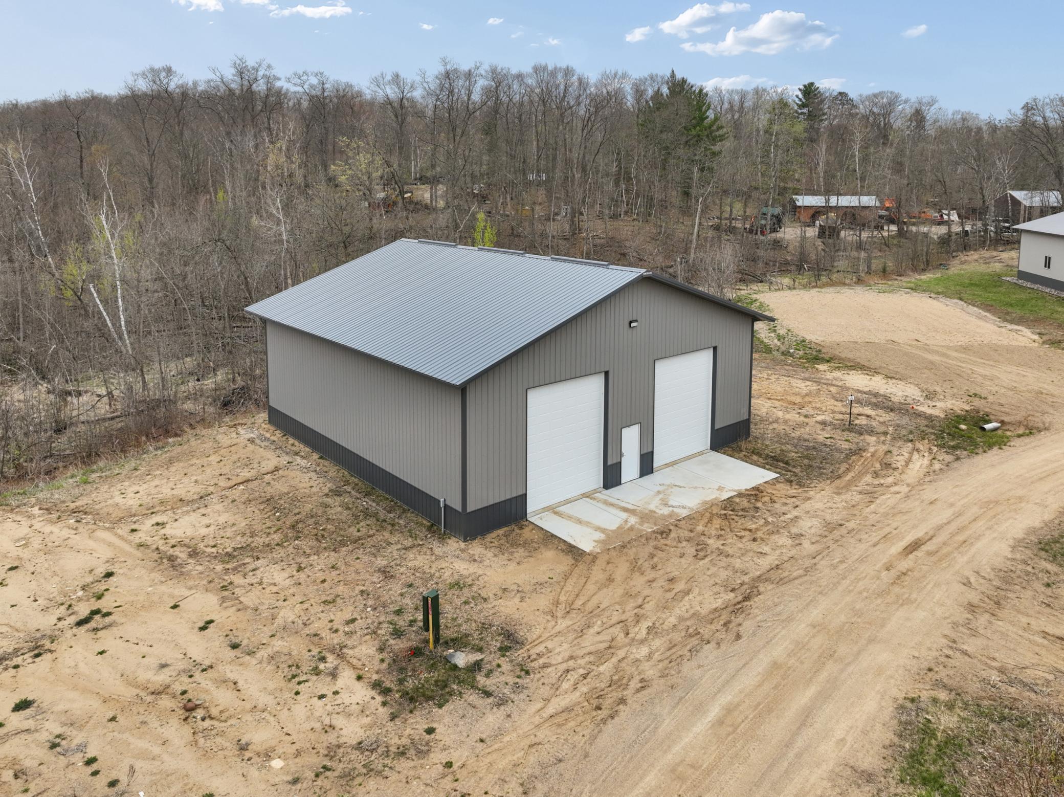 Multiple sites are available. Photo shown is the finished pole building located on Lot 5.