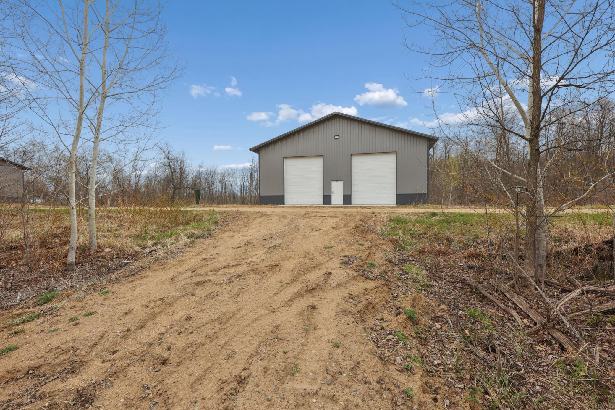 Multiple sites are available. Photo shown is the finished pole building located on Lot 5.