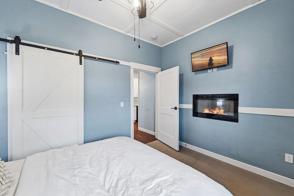 Guest Quarters Primary Bedroom with Electric Fireplace