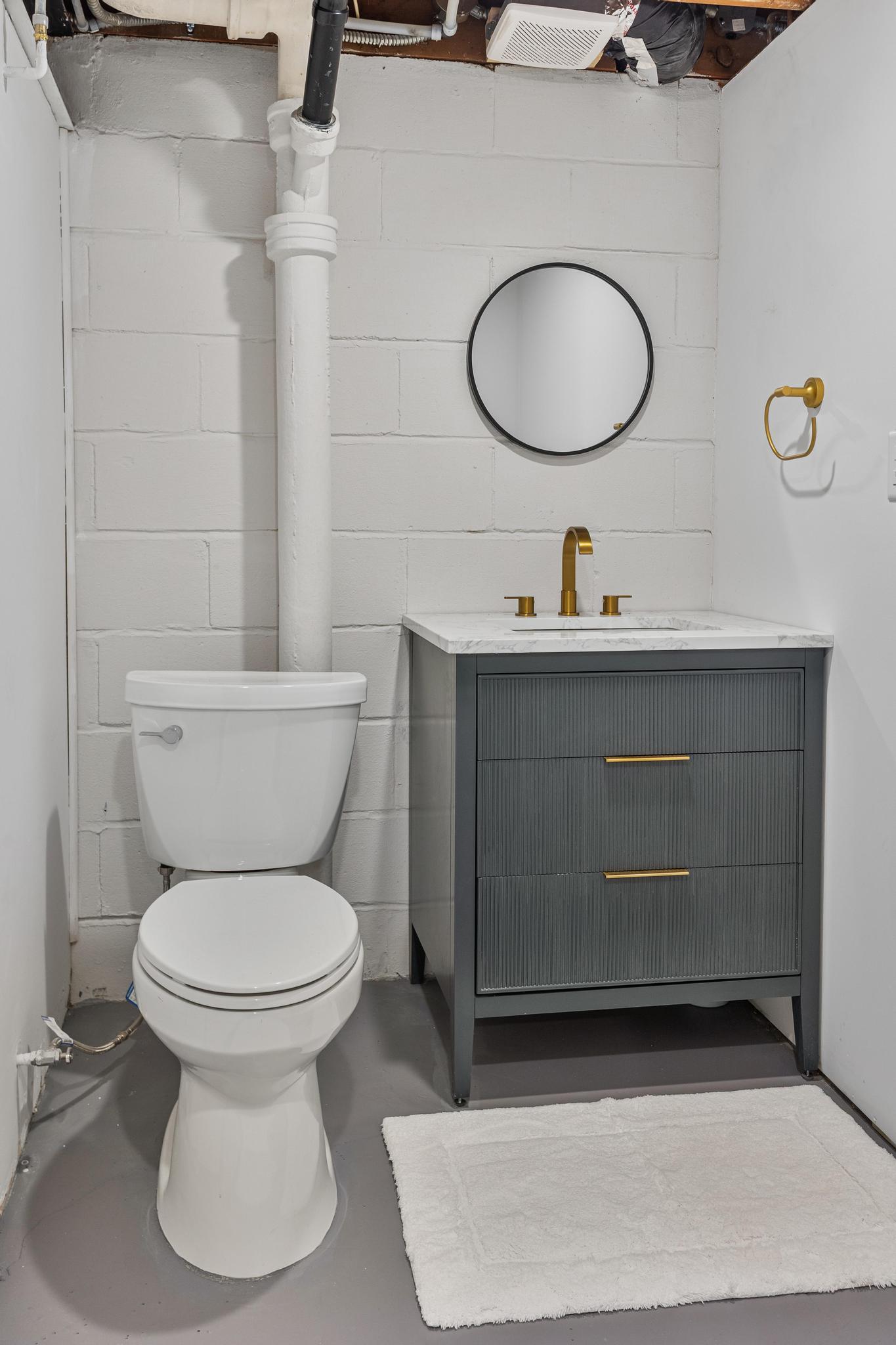 Reconfigured & Remodeled Basement Bathroom