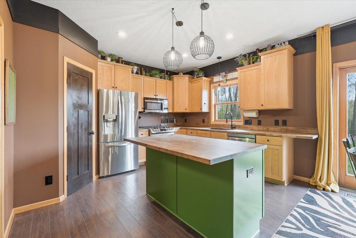 Spacious kitchen with added seating at the center island.