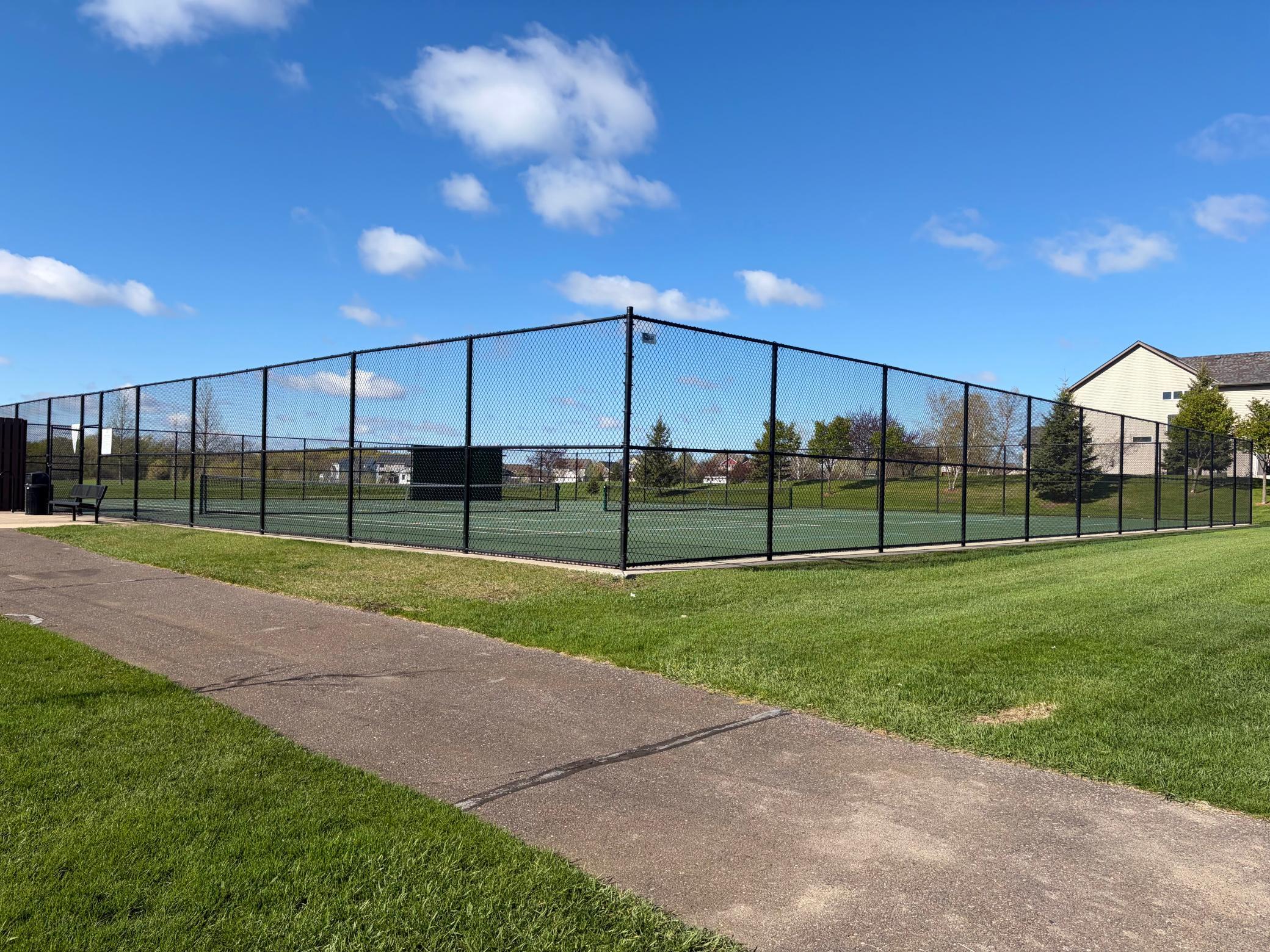 Tennis court located next to the park and the Dakota Trail