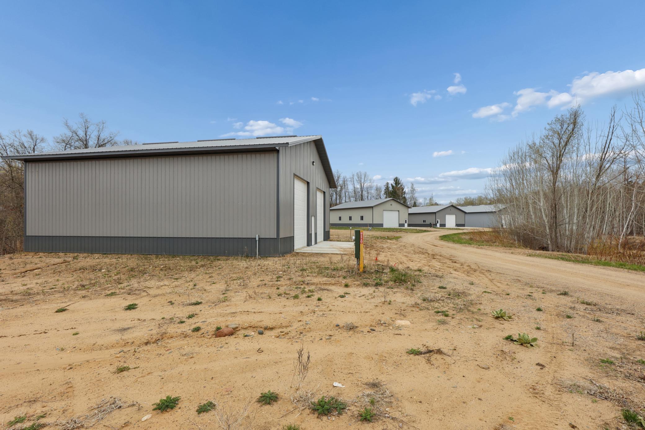 Multiple sites are available. Photo shown is the finished pole building located on Lot 5.