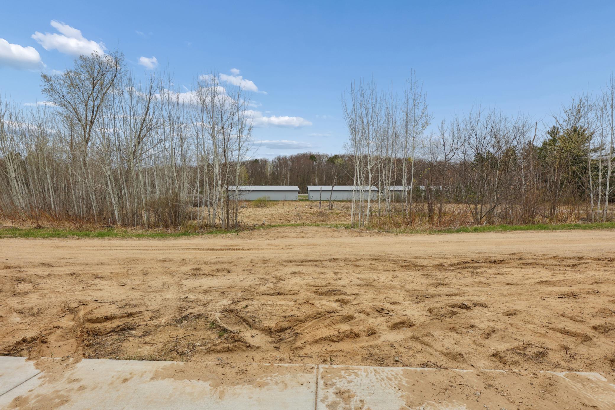 Multiple sites are available. Photo shown is the finished pole building located on Lot 5.