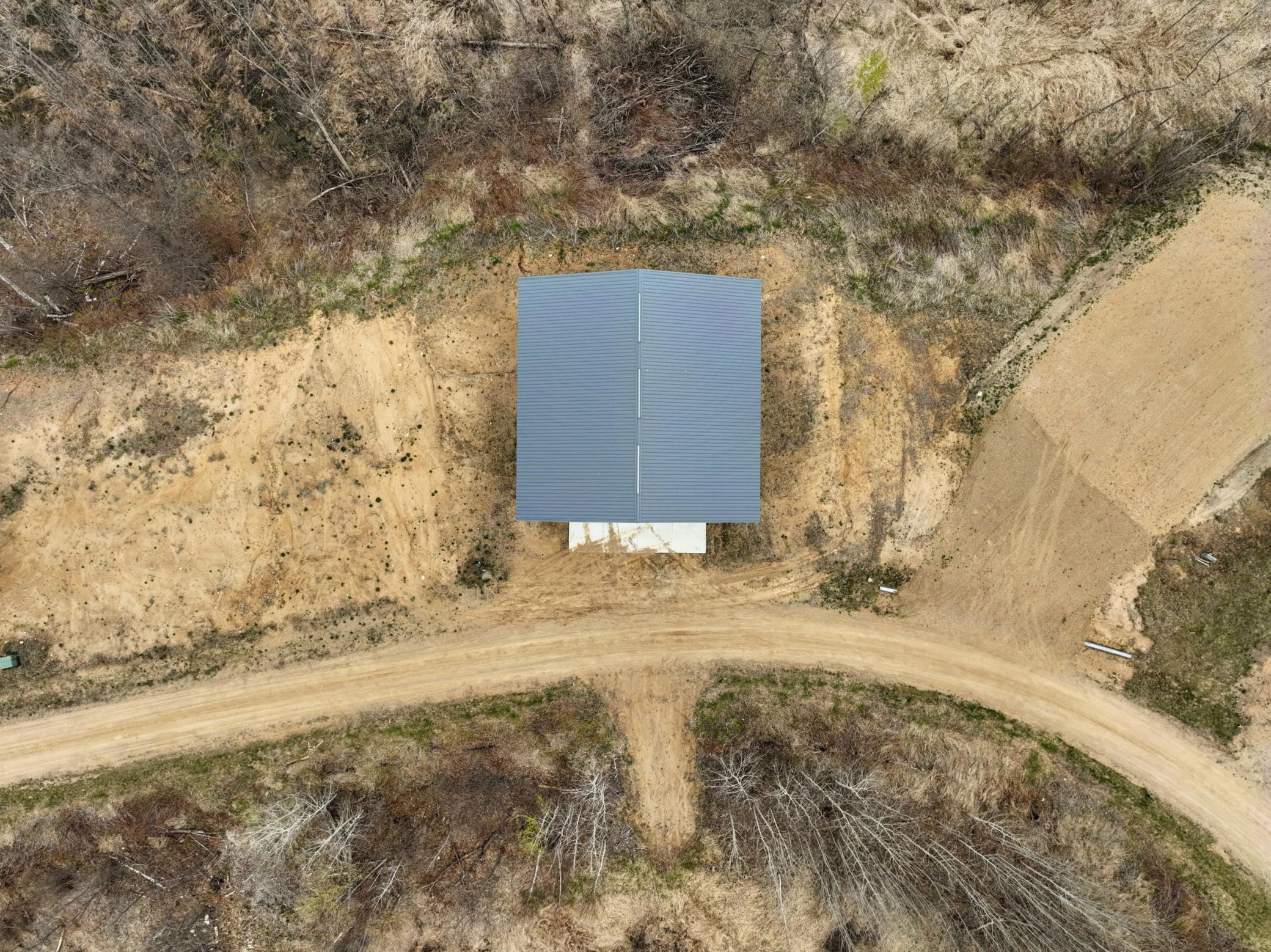 Multiple sites are available. Photo shown is the finished pole building located on Lot 5.