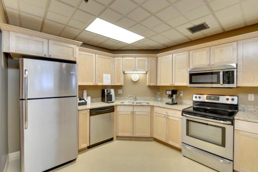 Community room kitchen - great space to reserve for large gatherings
