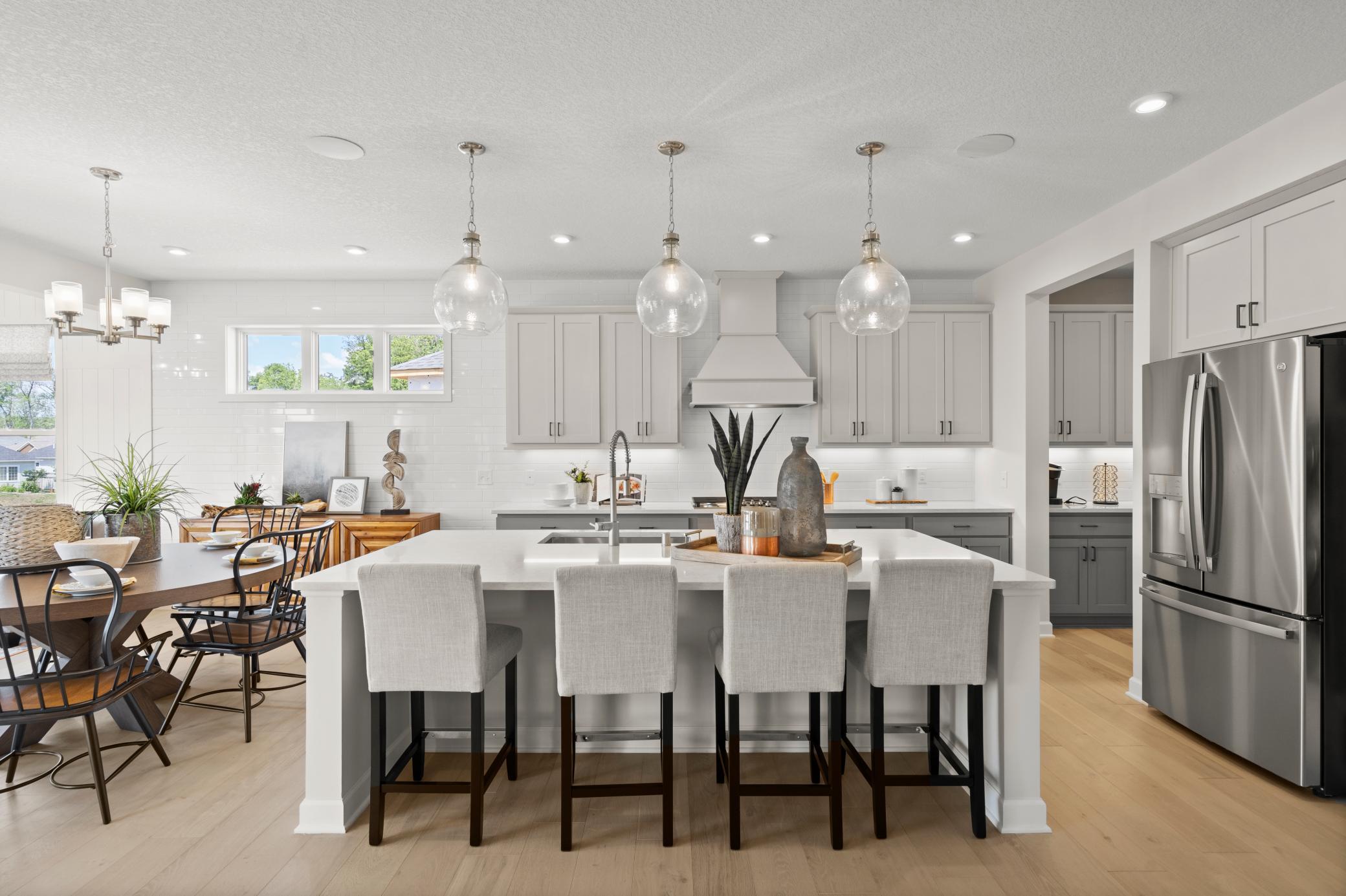 The spacious gourmet kitchen is the centerpiece of this home. Perfect for the gourmet chef or the entertainer! (model photo)