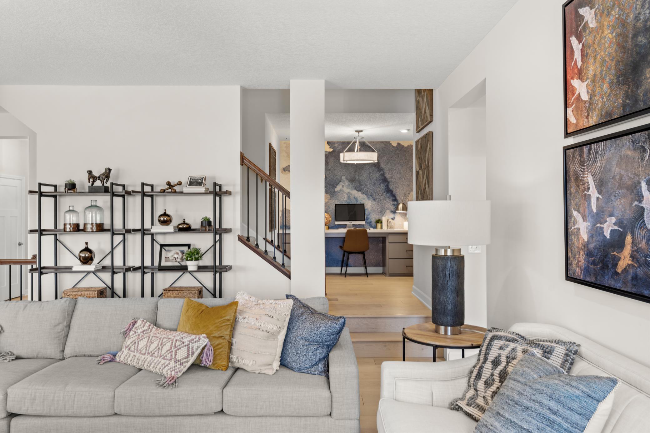 As you go upstairs you will find this convenient tech nook. (model photo)