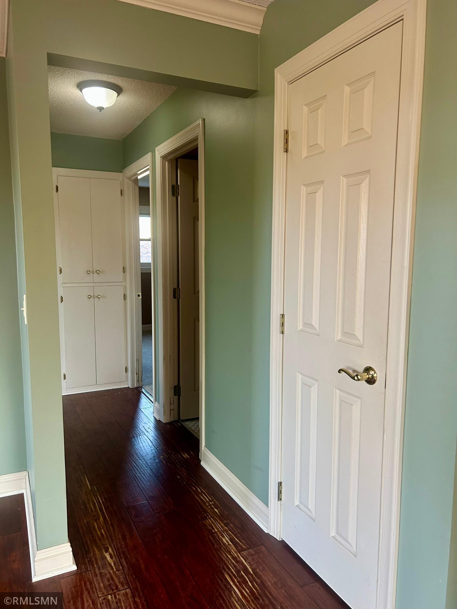 Hallway to main bedroom, 2nd bedroom and main floor bathroom