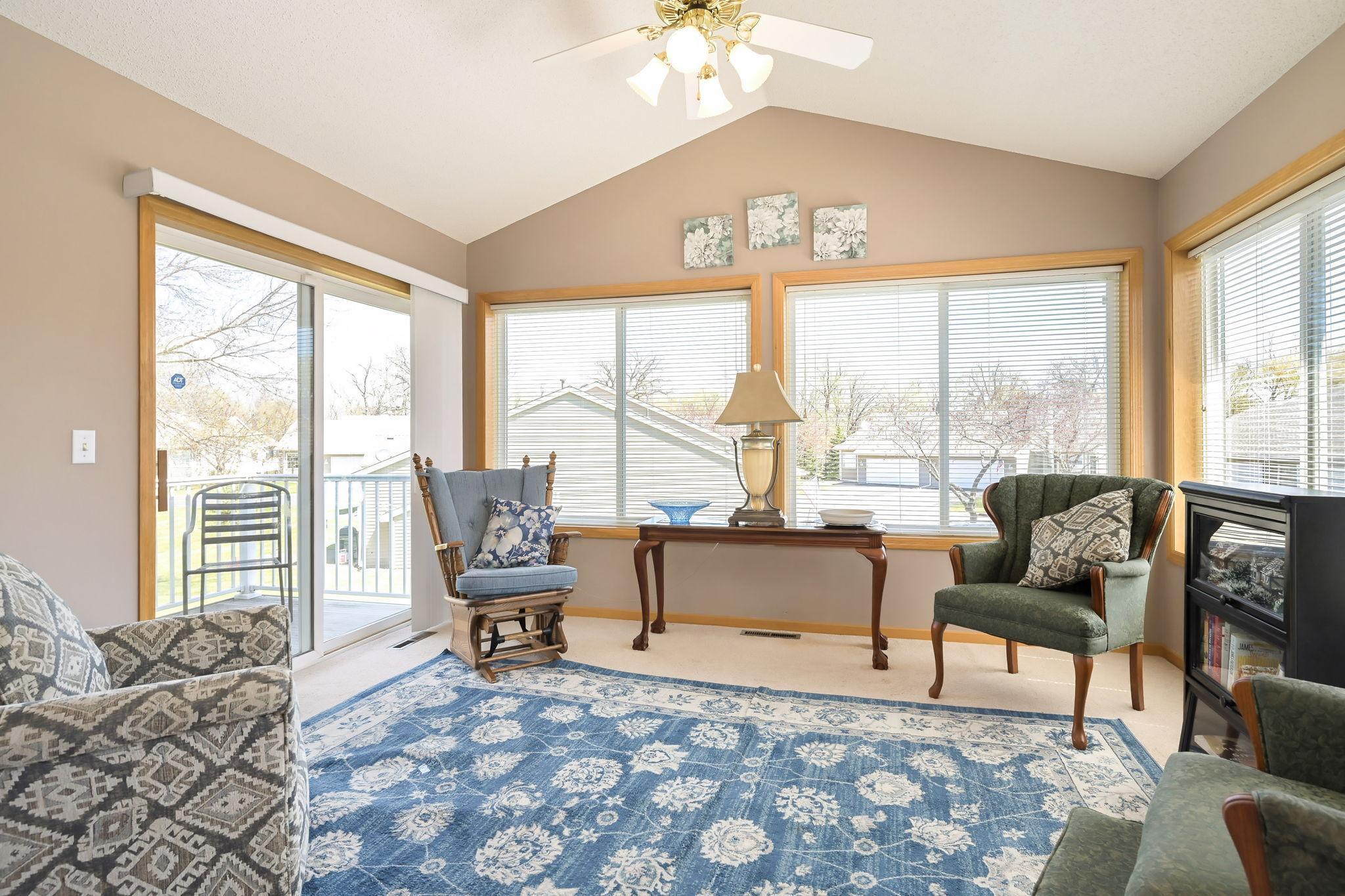 Bright sunroom off of the family room