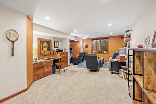 Finished basement with theater and large storage area