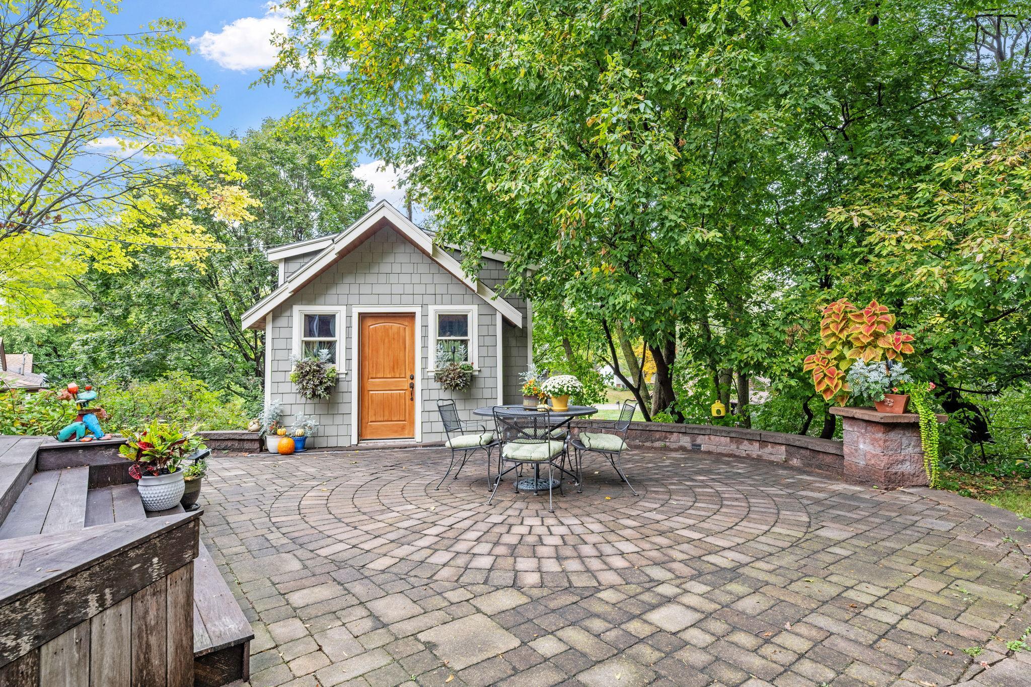 Amazing custom paver patio out back perfect for entertaining