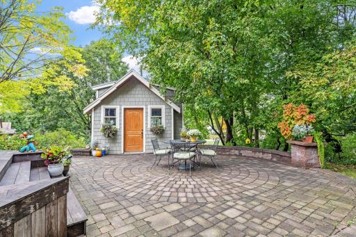 Amazing custom paver patio out back perfect for entertaining