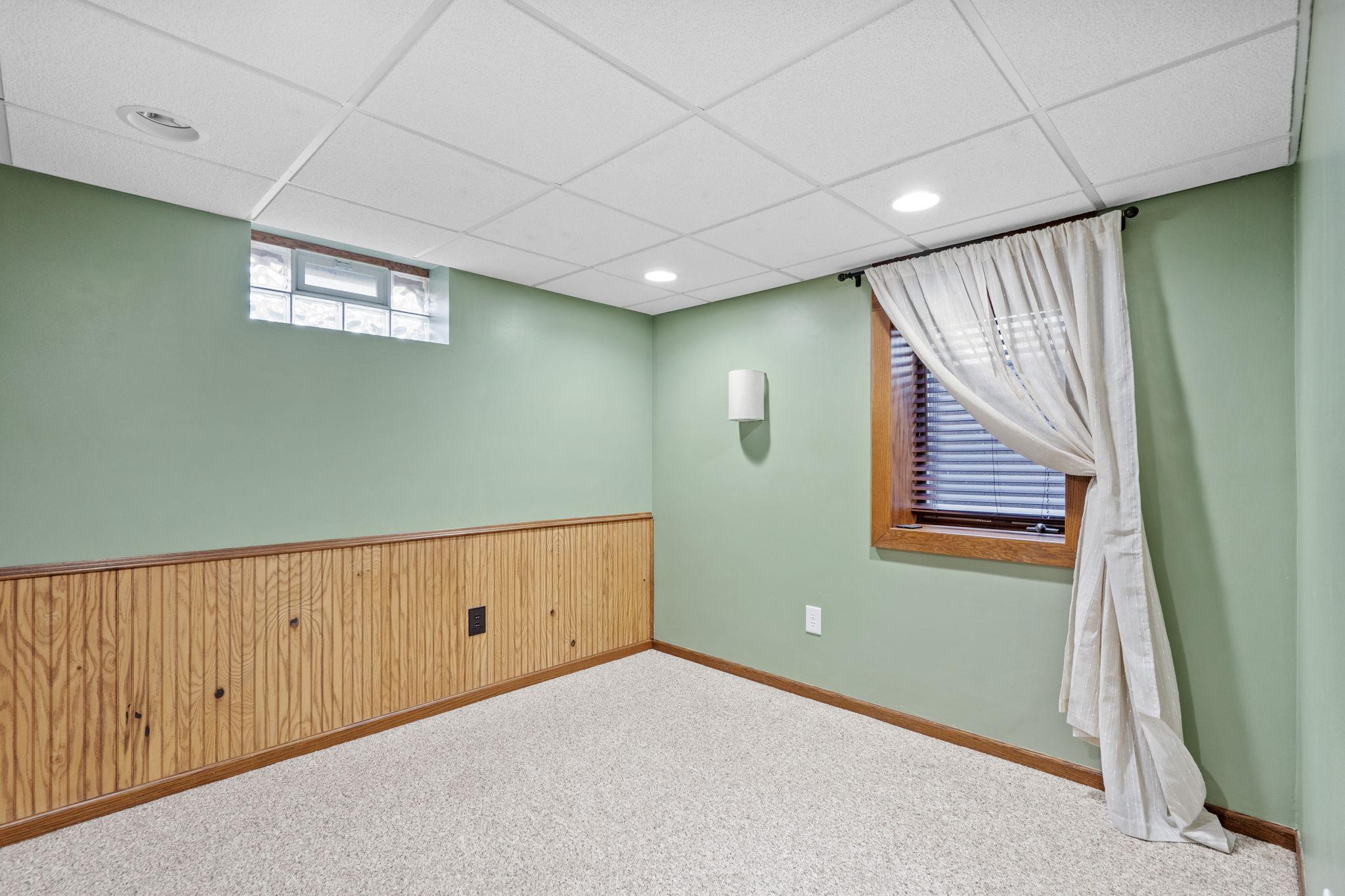 NOTE: This is the lower level 3rd bedroom. Photos of upper bedrooms and bathroom coming Wednesday!