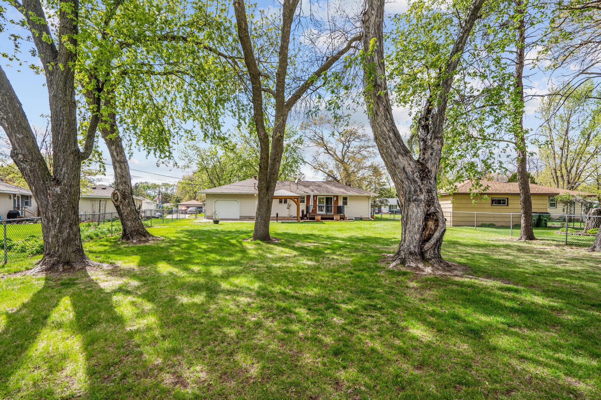 Don't miss the absolutely park-like backyard!