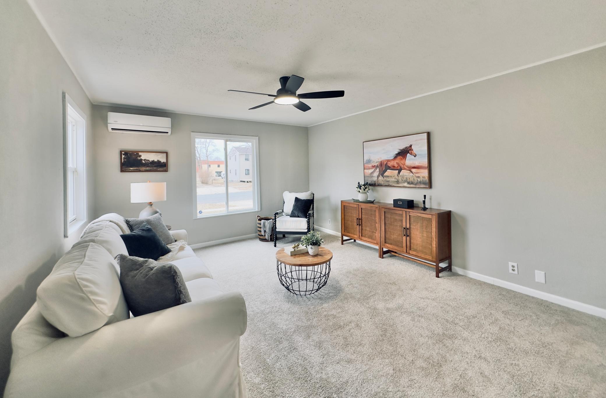 Spacious and bright living room at the front of the home.
