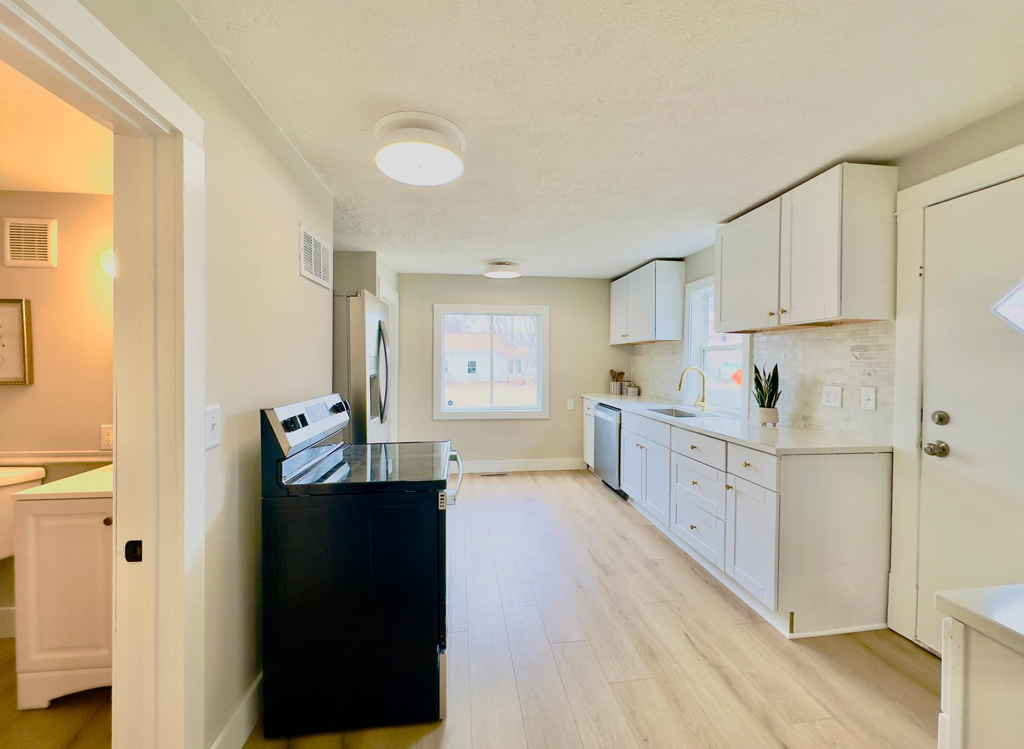 Luxury LVP with lifetime warranty in kitchen and baths