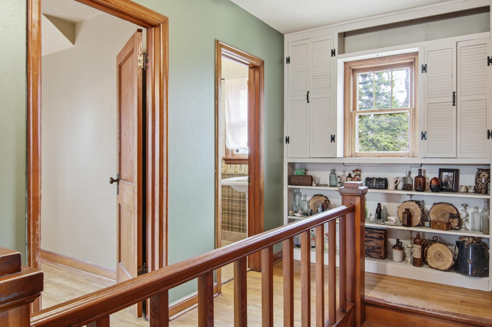 Half Bath is adjacent to the large bedroom at top of the stairs