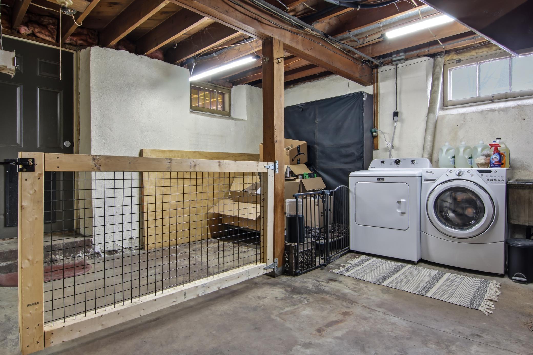 Indoor Kennel area next to the basement walkout door