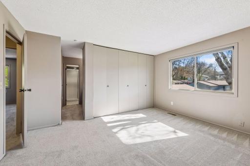 Primary bedroom with plenty of closet space