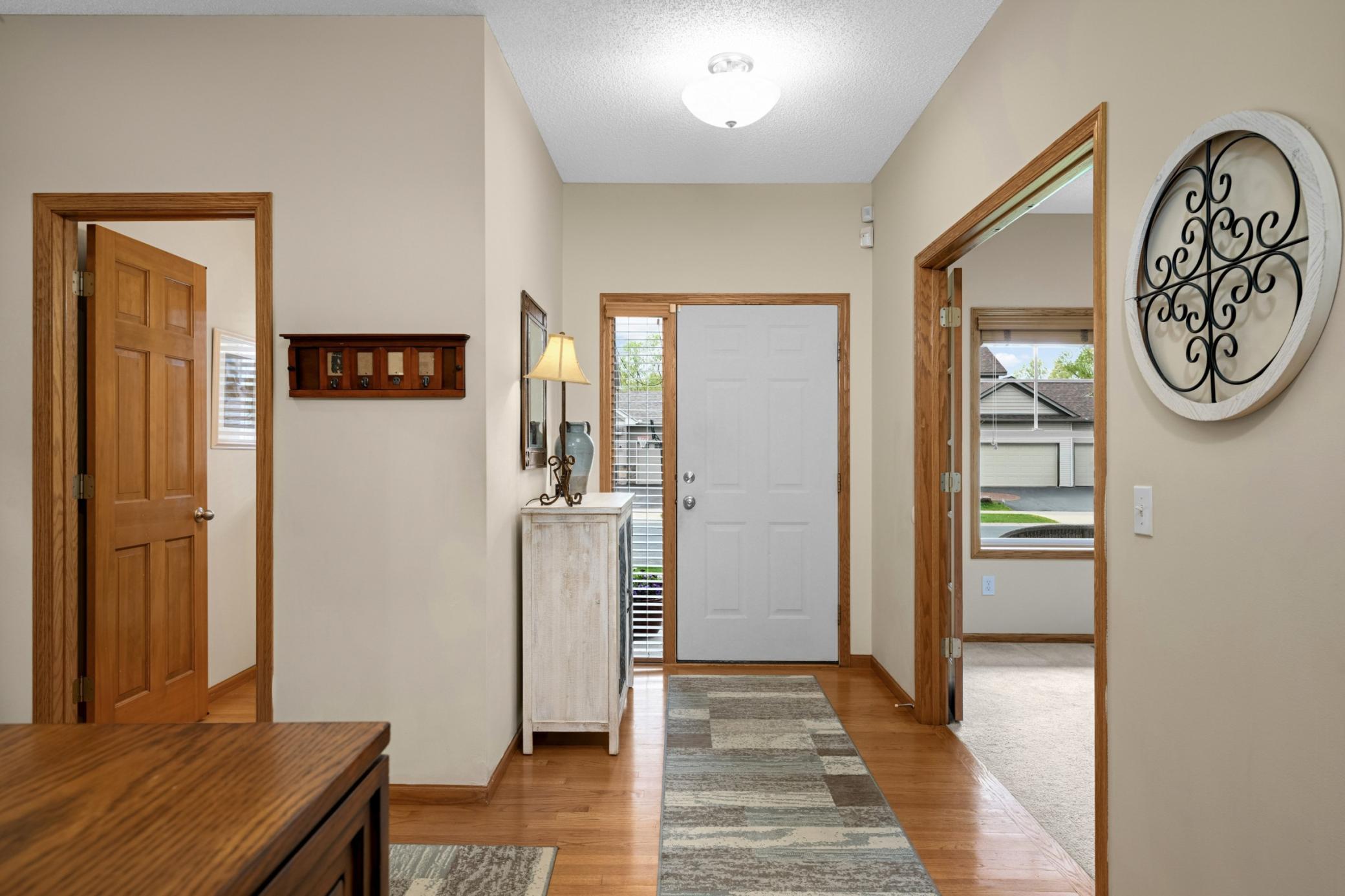 Hardwood floors in the foyer and kitchen/dining areas.