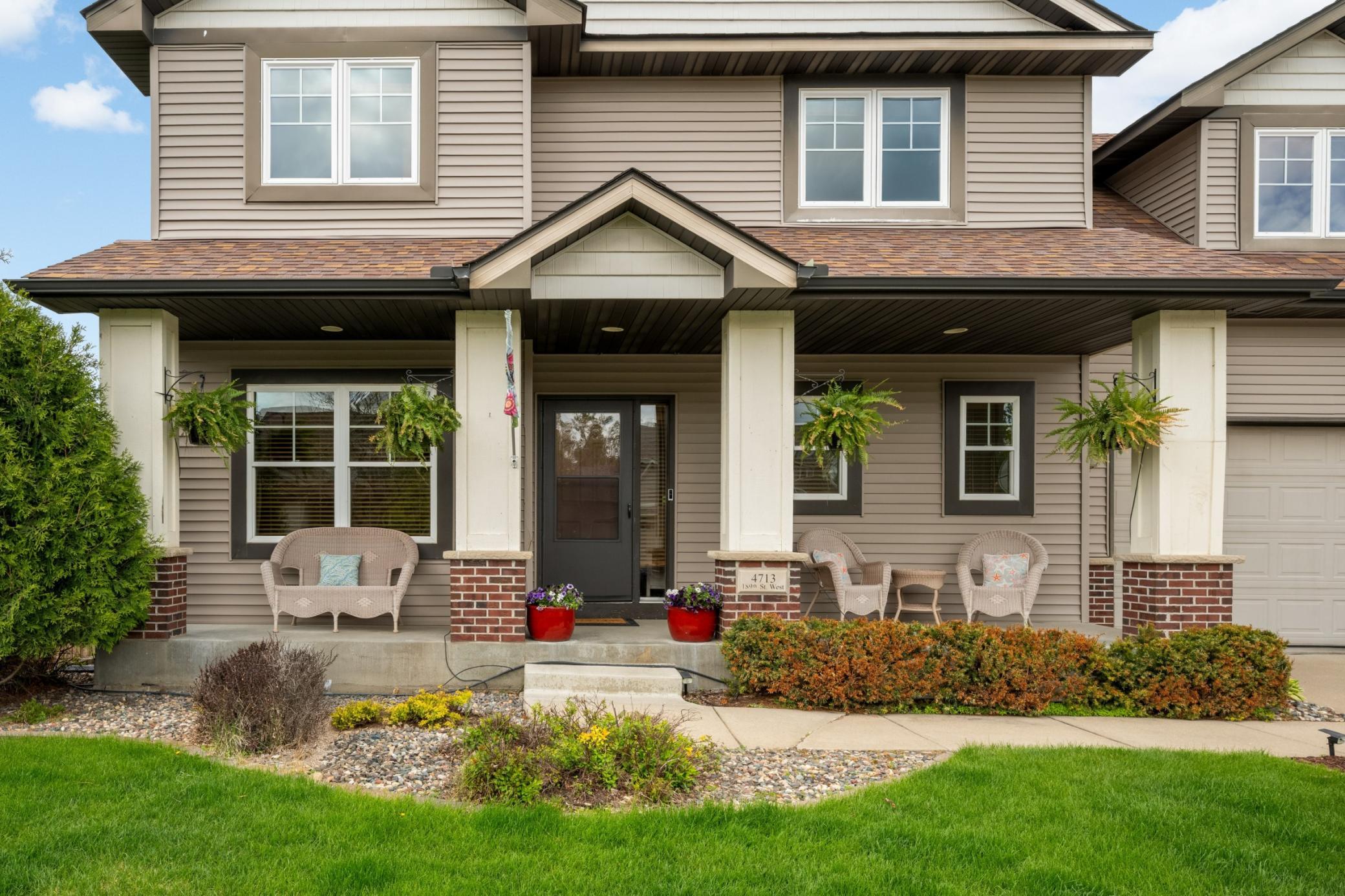 Home features a large covered front porch.