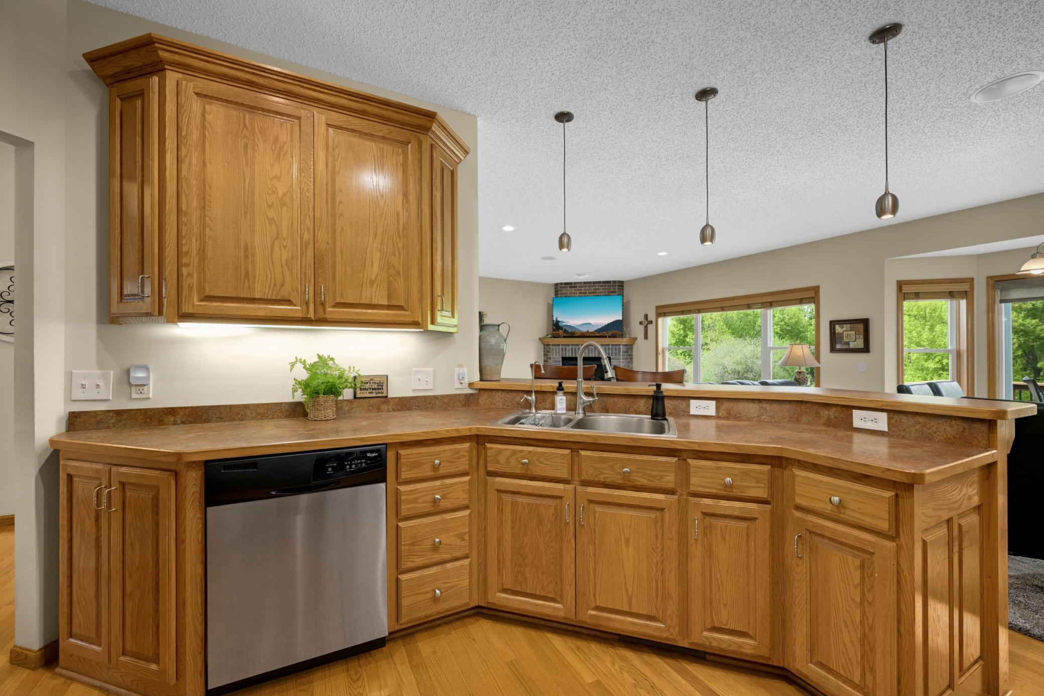 Kitchen has a large island for seating as well.
