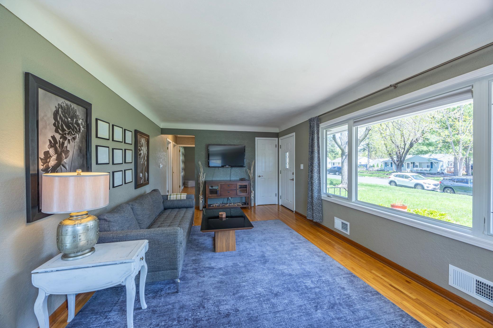 Living room with a large bay window