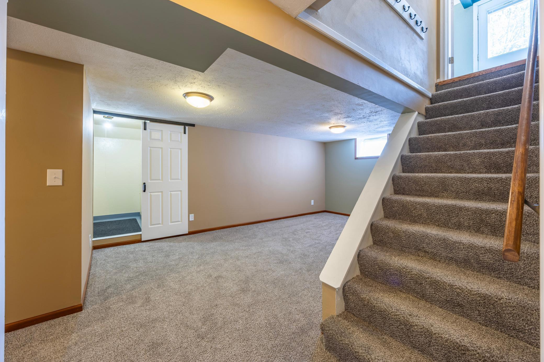 Head downstairs to a finished lower level