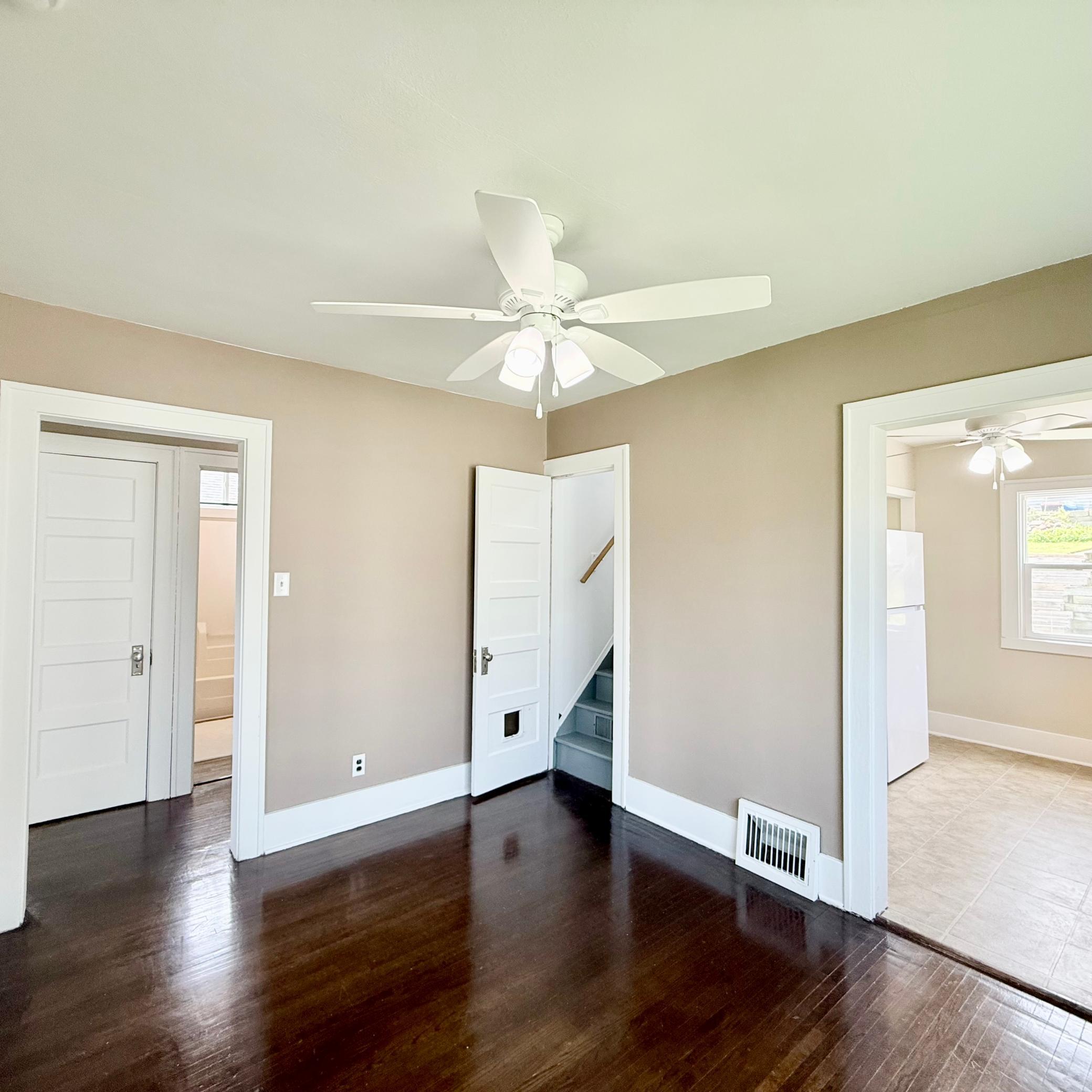 View of Hall, Upstairs, and Kitchen Entrances