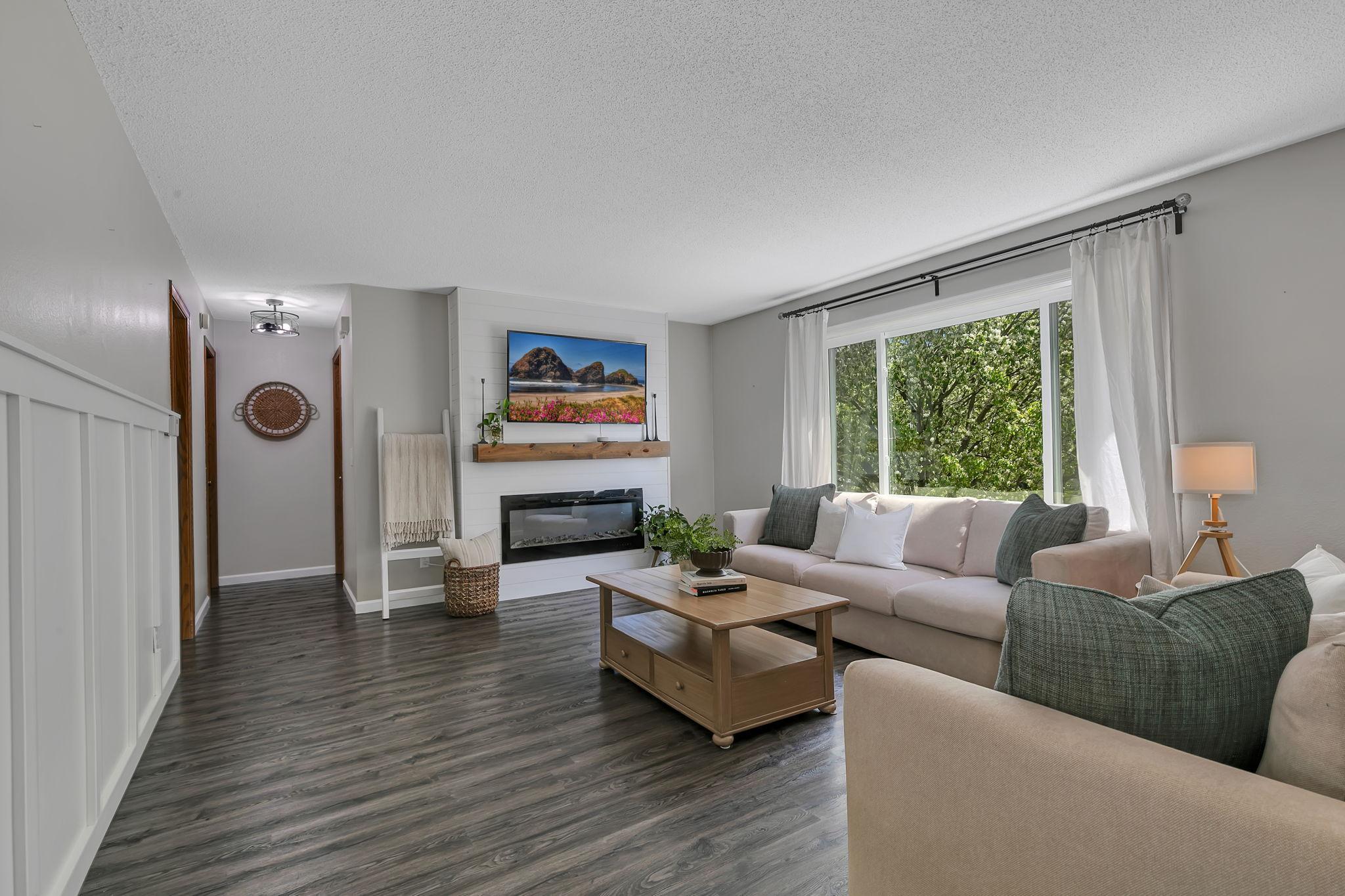 Upper level living room overlooking the fireplace