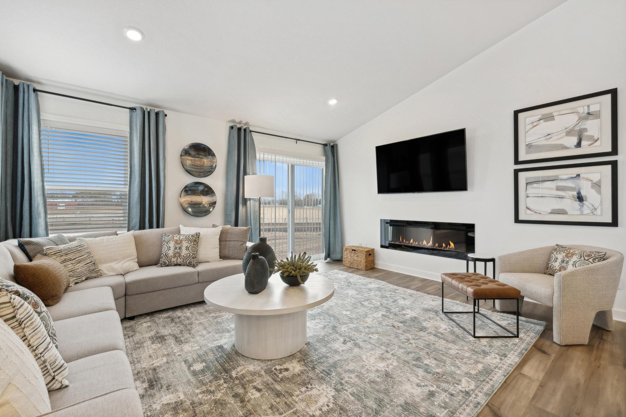 (Photo of decorated model, actual home's finishes will vary)The great room is cozy and contemporary.