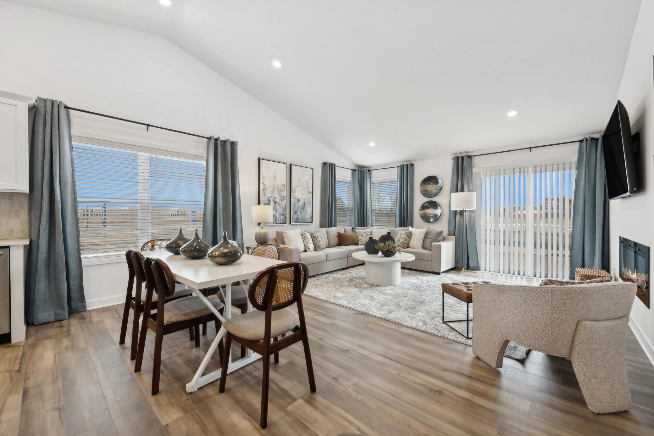(Photo of decorated model, actual home's finishes will vary) Soaked in natural sunlight, the homes great room is a great place to spend time!