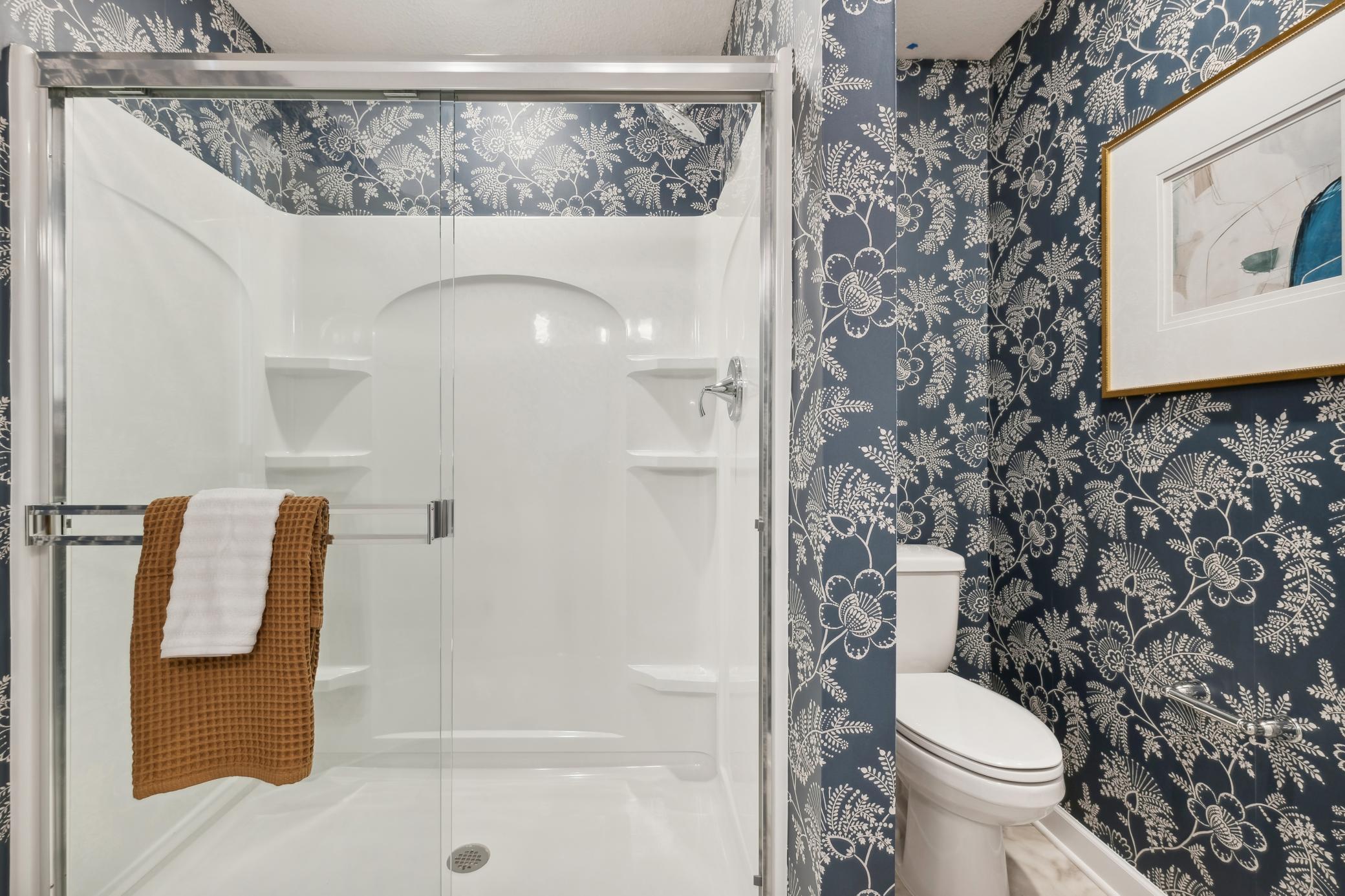 (Photo of decorated model, actual home's finishes will vary) Another view of the owners bath!
