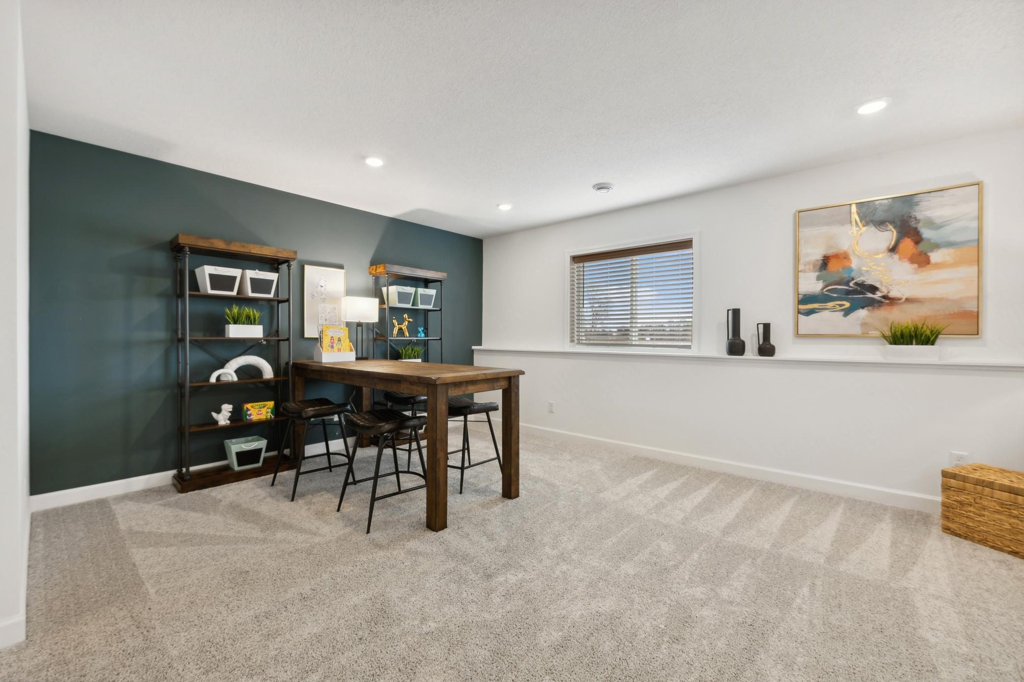 (Photo of decorated model, actual home's finishes will vary) A perfect spot for homework or arts and crafts!