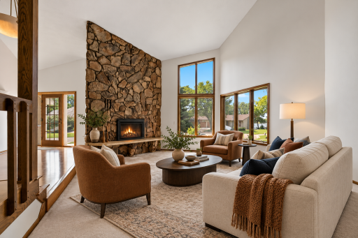 10300 27TH AVE N LIVING ROOM WITH FIREPLACE VIRTUALLY STAGED.png