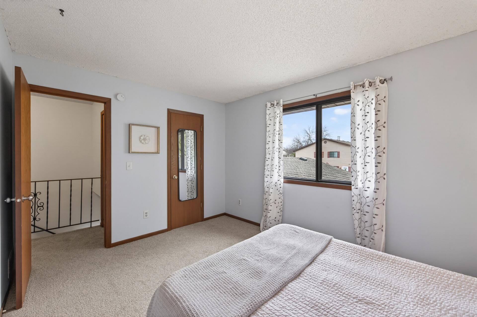 Large walk-in closet behind the door