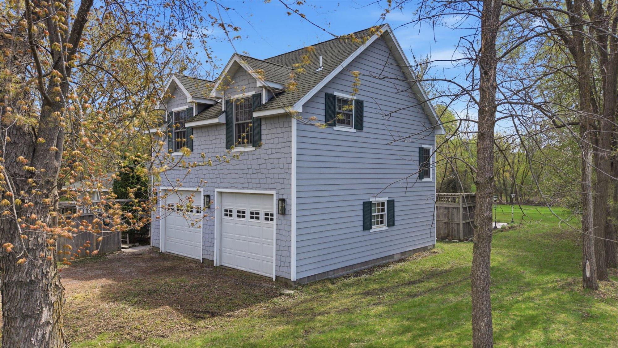 Oversized 2 Car Garage With Living Above.
