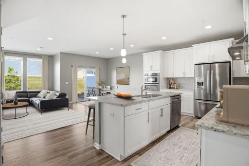 View of kitchen, Dining and Living. Virtually Staged