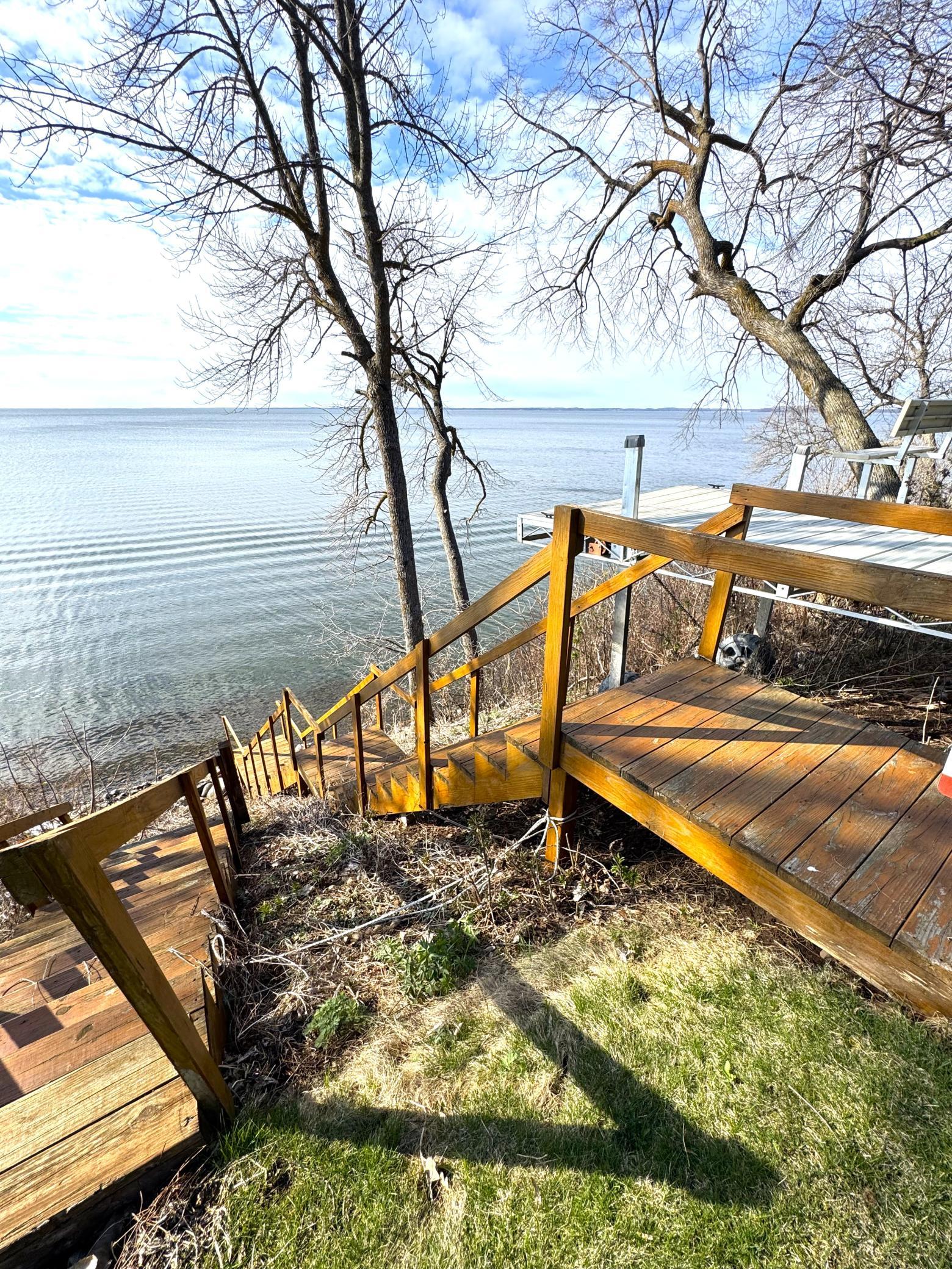 The dock will be in the water soon. They always wait for the last of the ice to disappear.