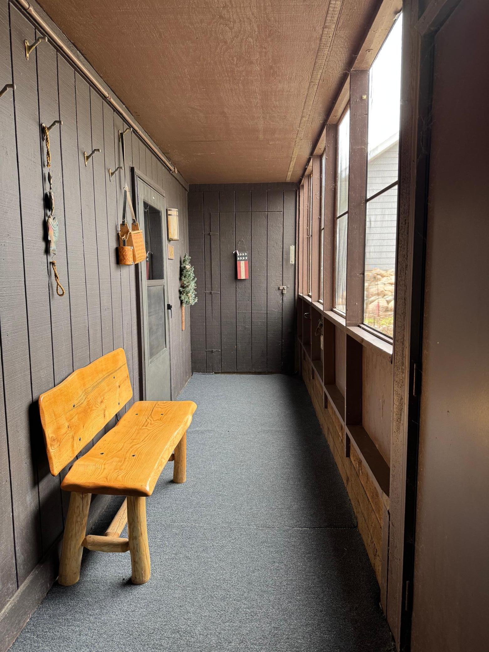 Breezeway with a storage closet at the other end.