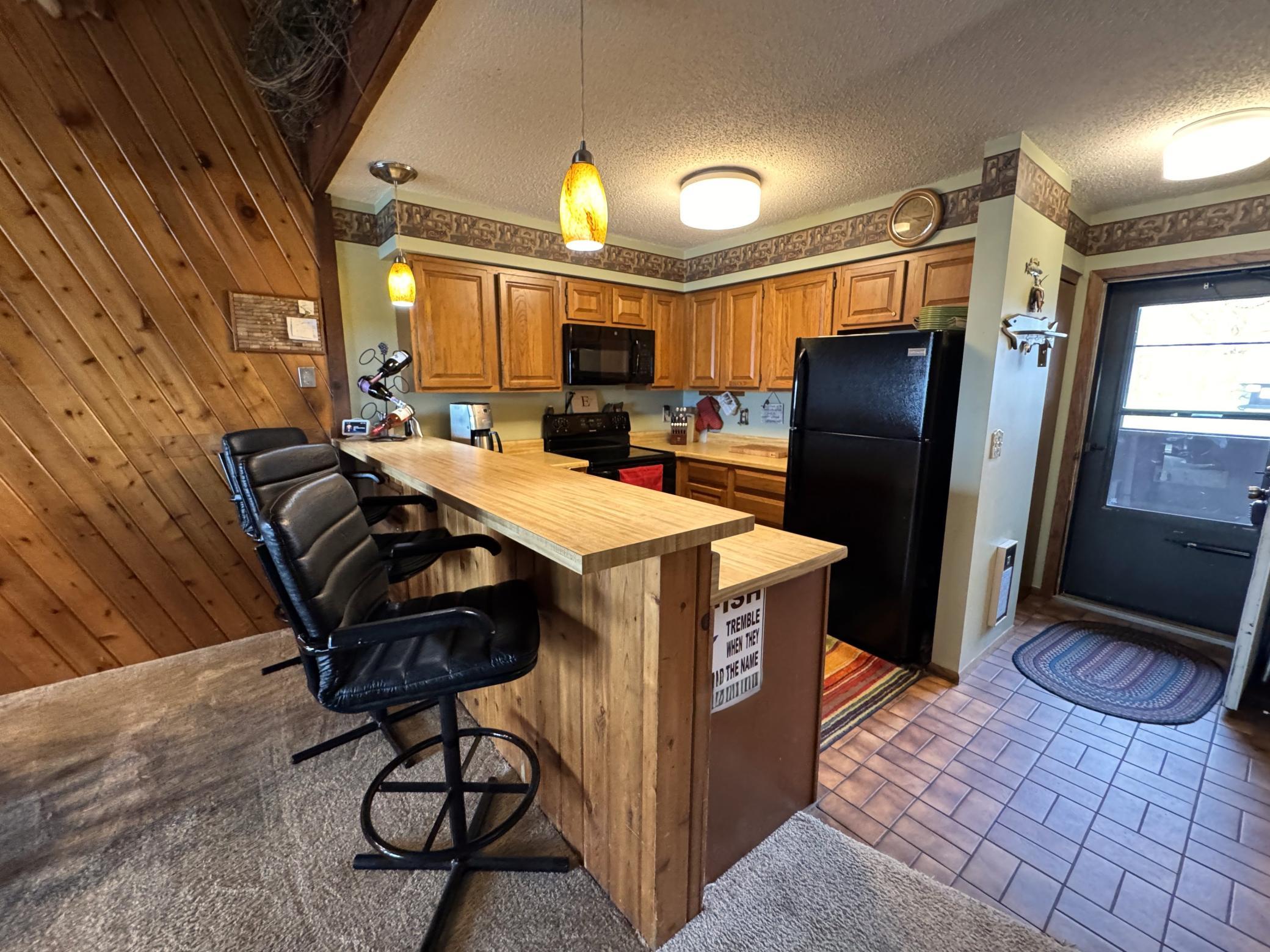 As you enter from the breezeway you'll come into the kitchen area.
