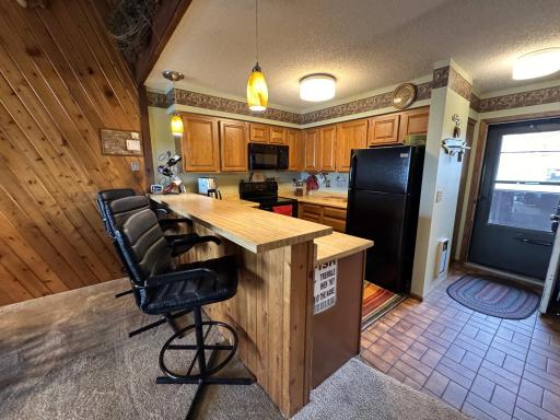 As you enter from the breezeway you'll come into the kitchen area.