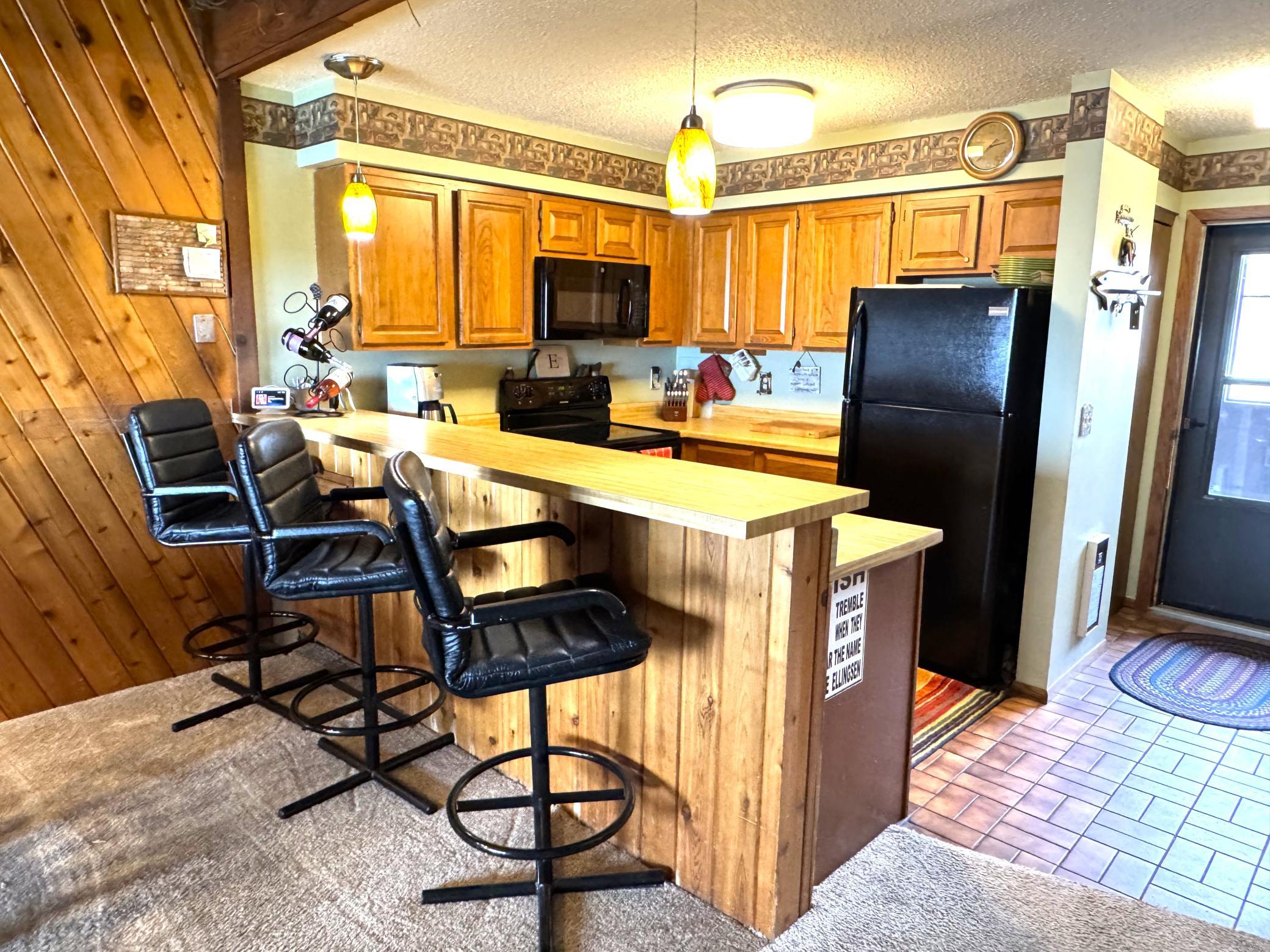 The kitchen is perfect for those family gatherings. The open concept gives you lots of space for entertaining.