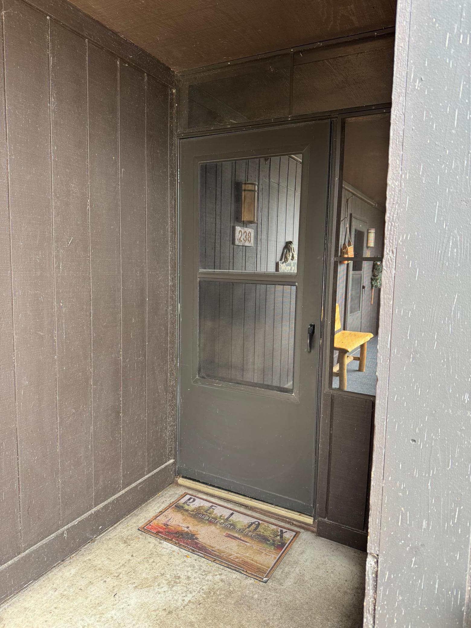 Entrance to the back door through the breezeway.