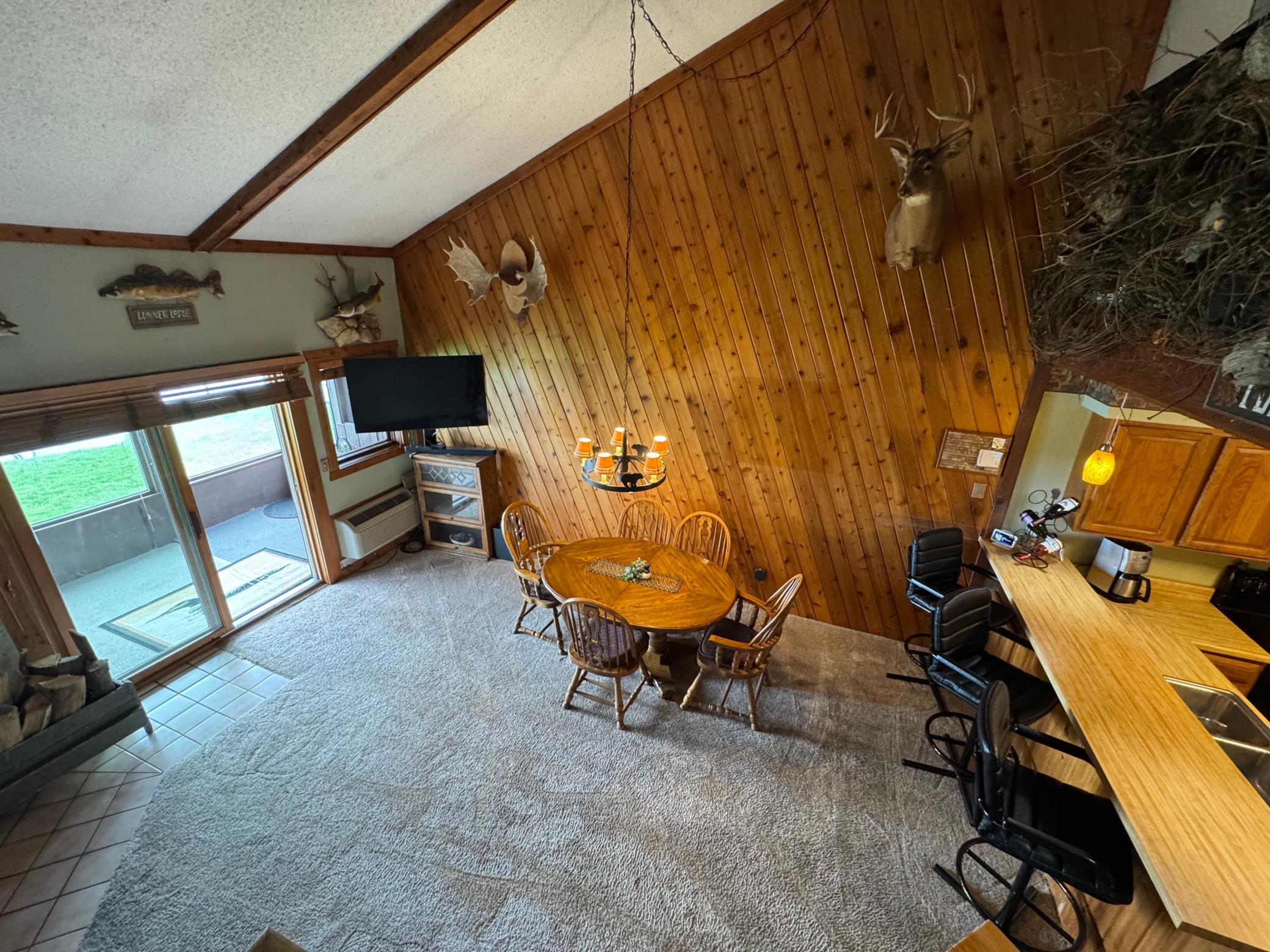 Another view from the loft area. Through the living room patio door you'll access the lakeside porch.